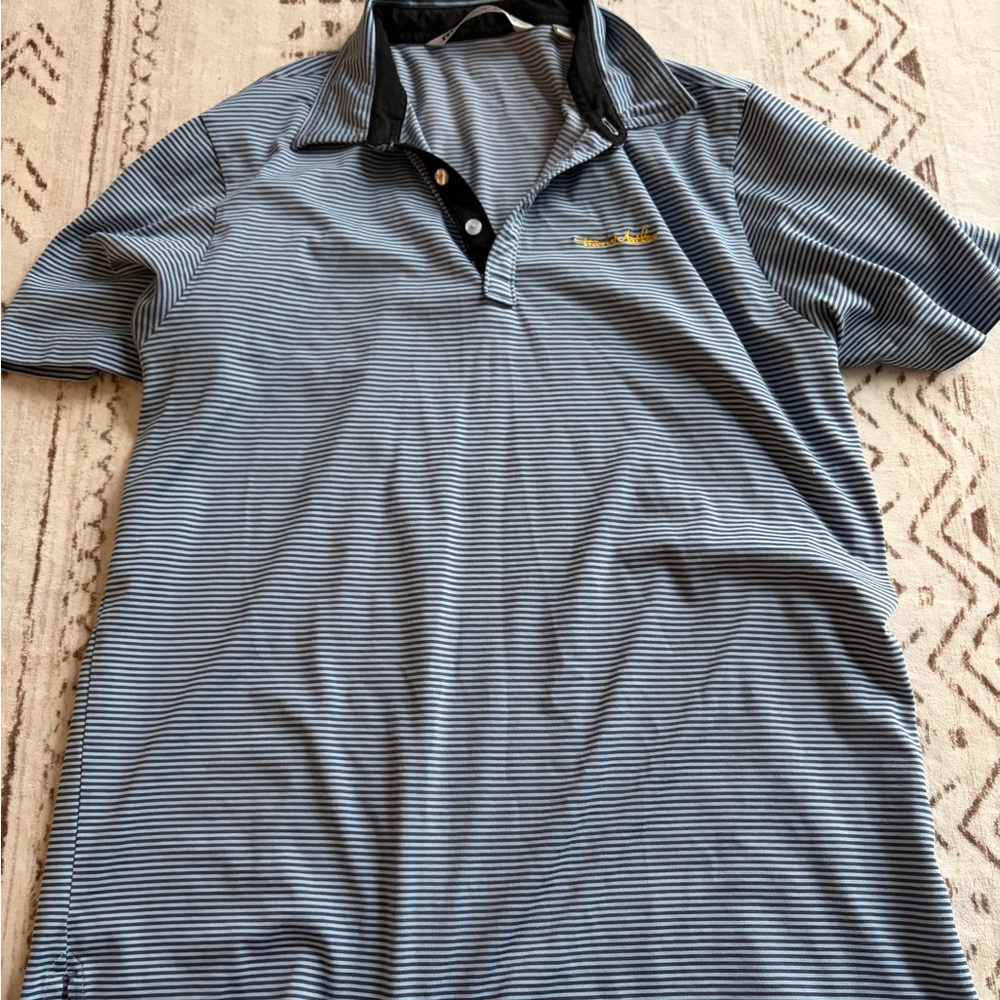Travis Matthew’s Striped Polo Shirt